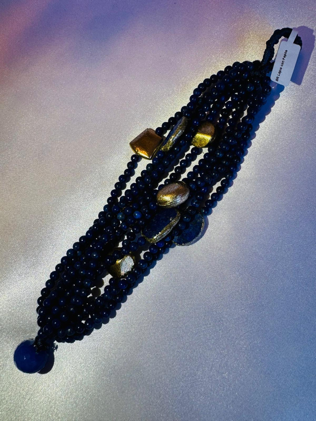 Multi strand Blue beaded bracelet with lapis lazuli and golden nuggets