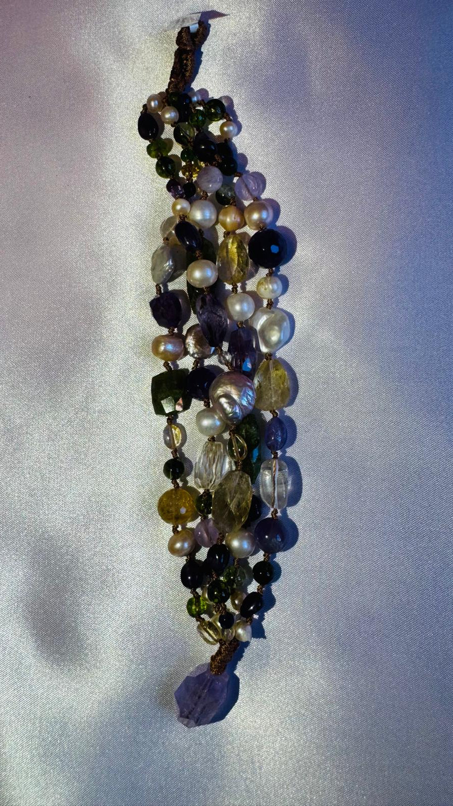Multi strand bracelet with semi precious stones