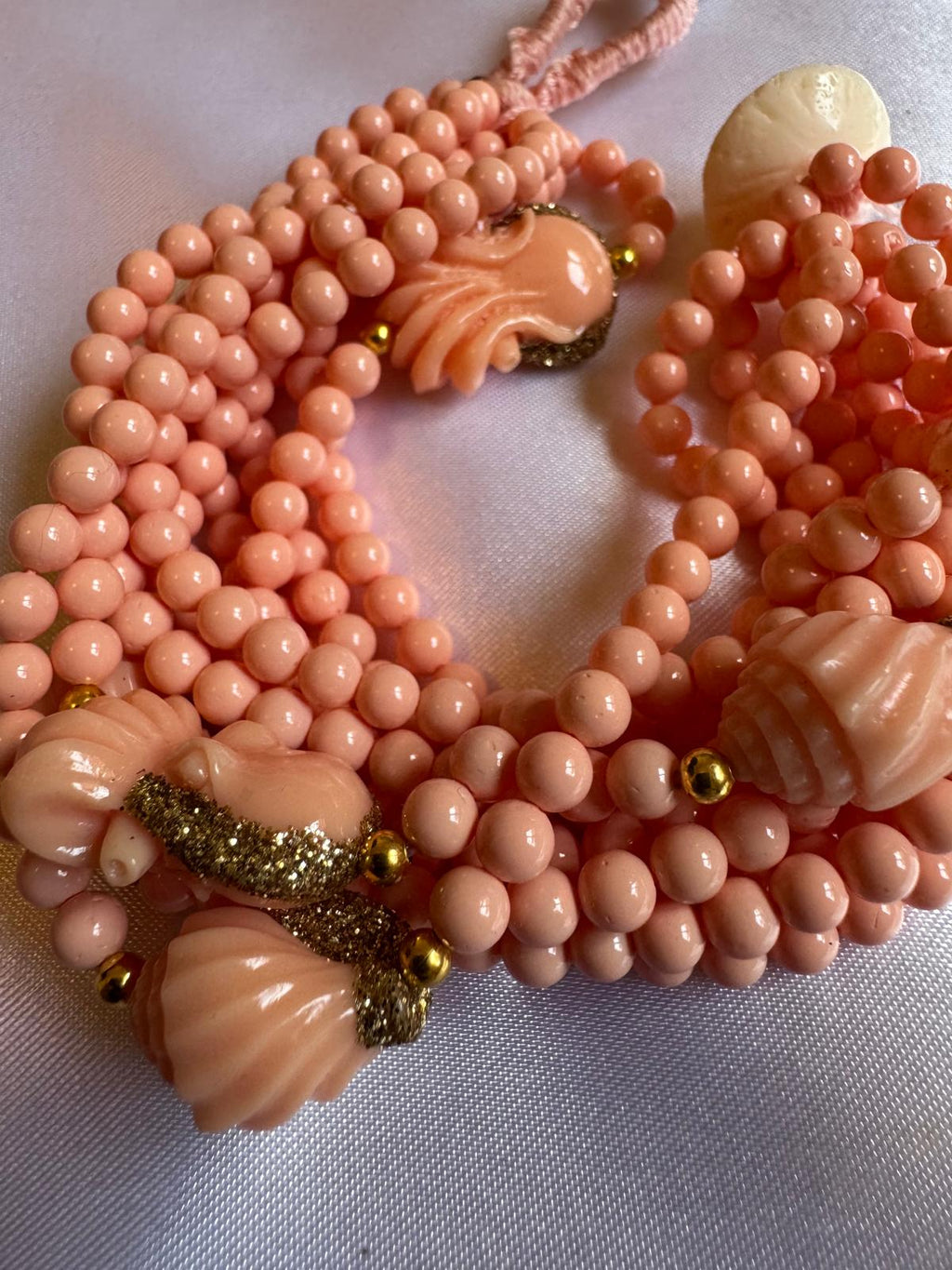 Pink shell and resin bracelet.