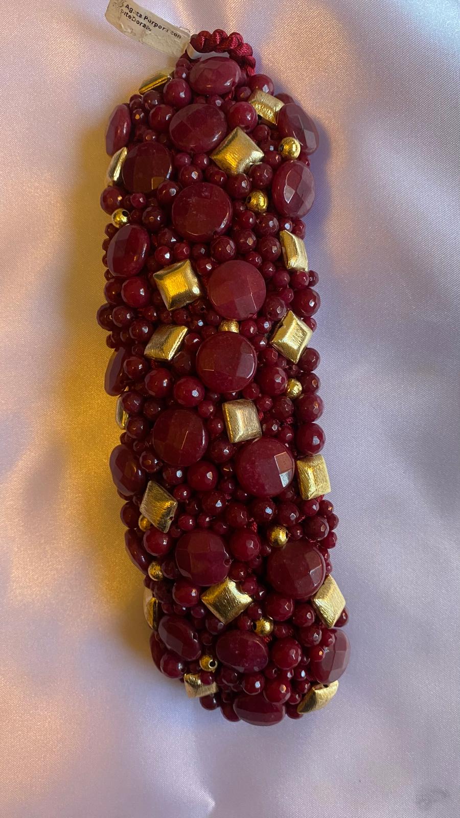 Dark Red Agate Bracelet with Golden nuggets and a Mother of Pearl clasp.