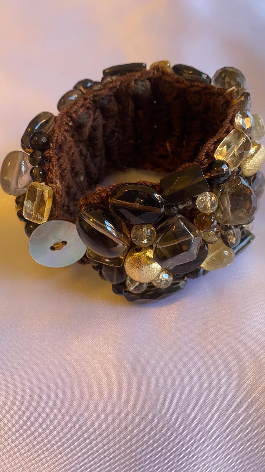 Bracelet with Brown Smoky Quartz, Citrine, Golden nuggets, and a mother of Pearl clasp.