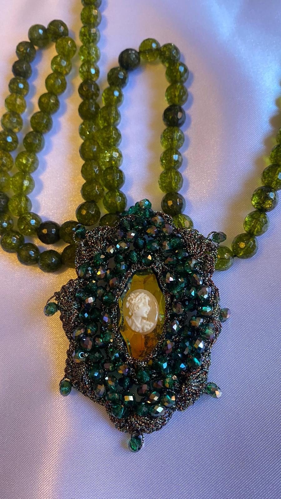 Peridot Pendant, Green Swarovski crystals, and cameo on macramé.