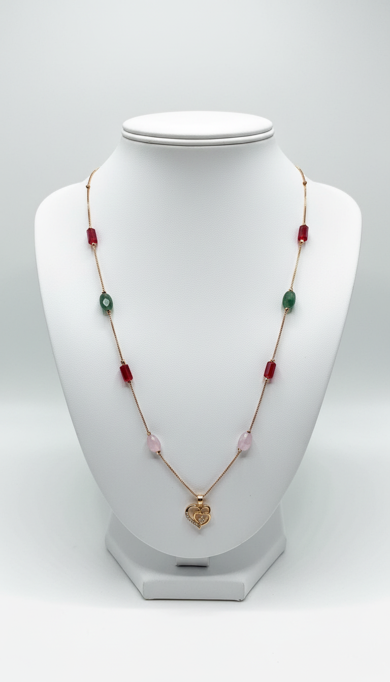 Elegant dual heart golden pendant with golden chain and red green and pink stone accents