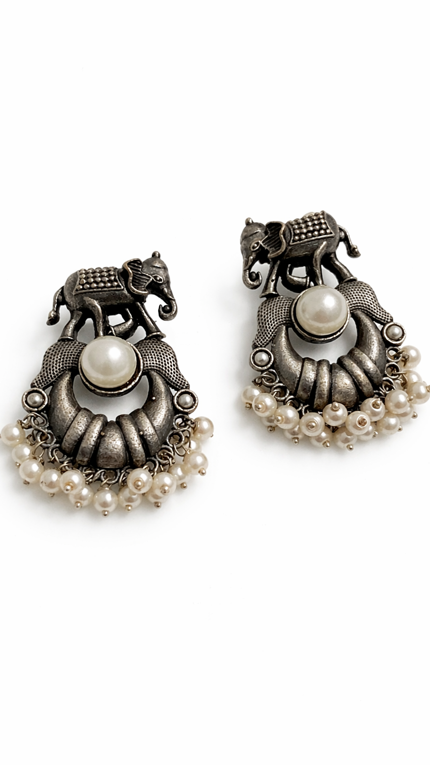 Boucles d'oreilles en perles et motif éléphant