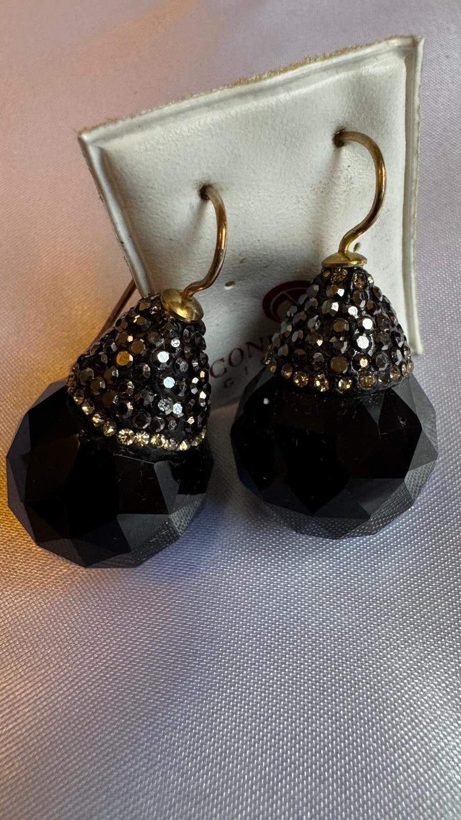 Black faceted earrings with gold accents 