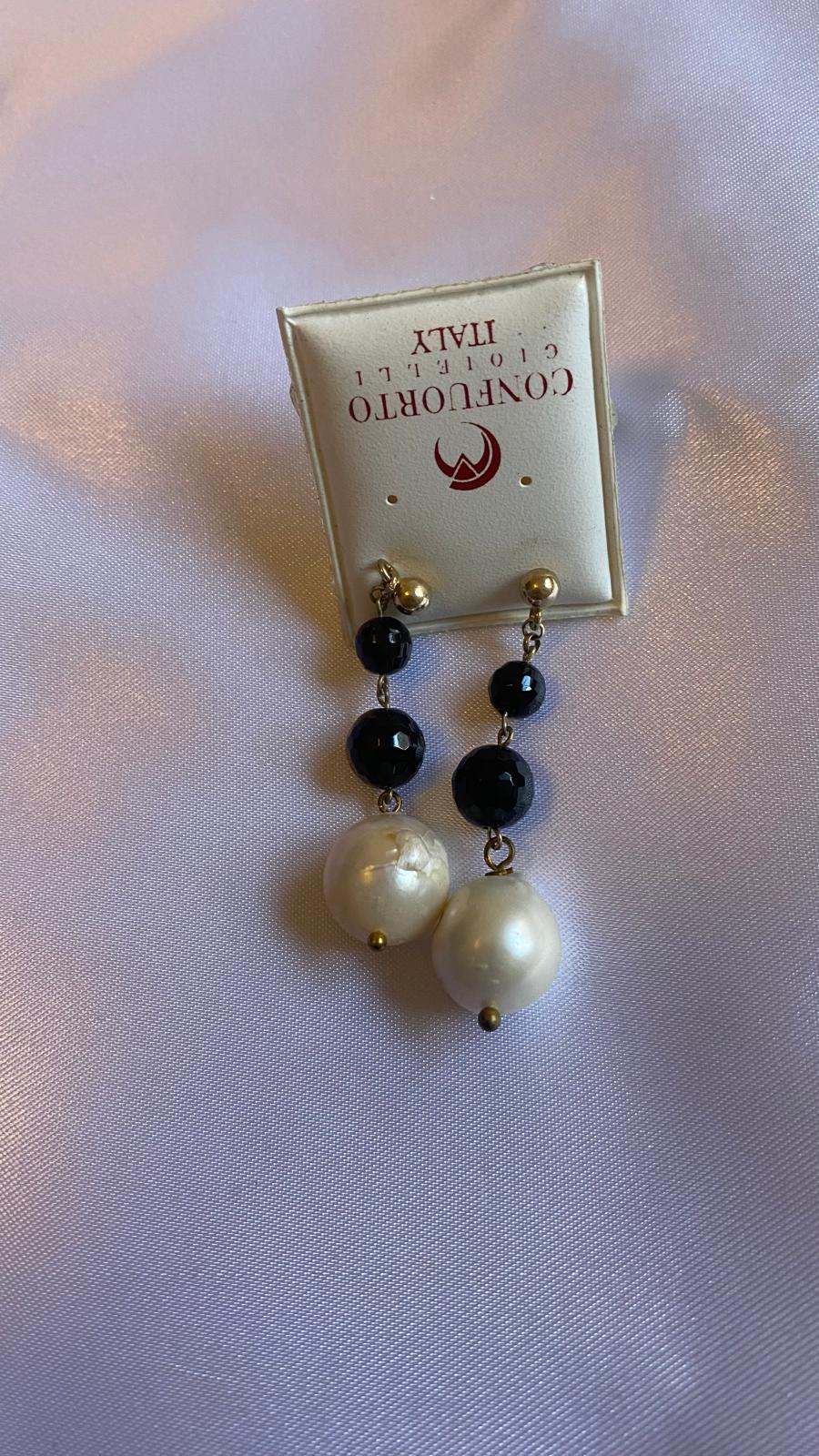 Onyx and freshwater pearl earrings.