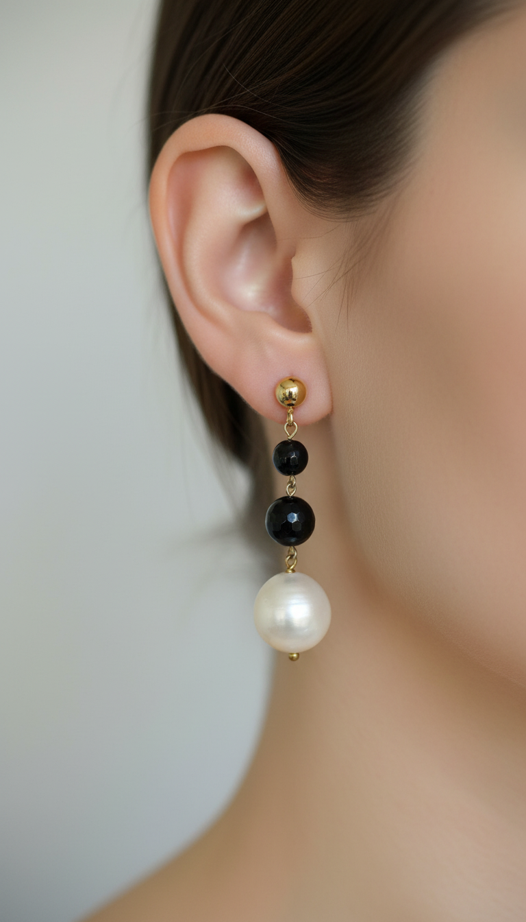 Onyx and freshwater pearl earrings.