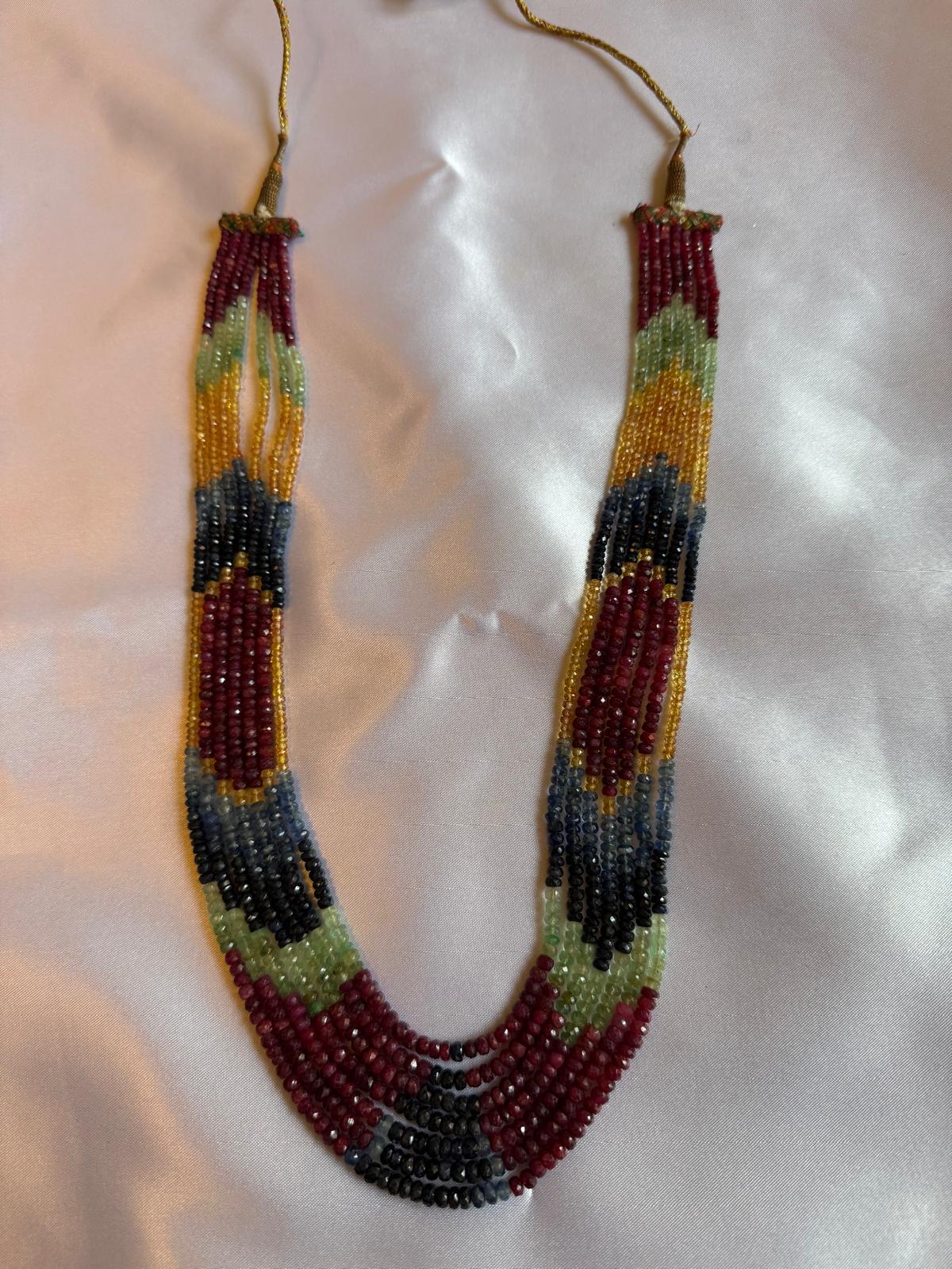 Multicolored 7 strand necklace with Ruby, Emerald, Sapphire, and Topaz