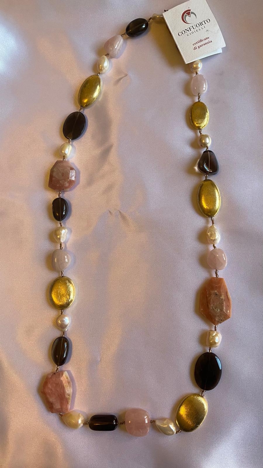 Necklace made of Amethyst, Smoky Quartz, Jasper, Rose Quartz, Freshwater Pearls,Golden nuggets and onyx.