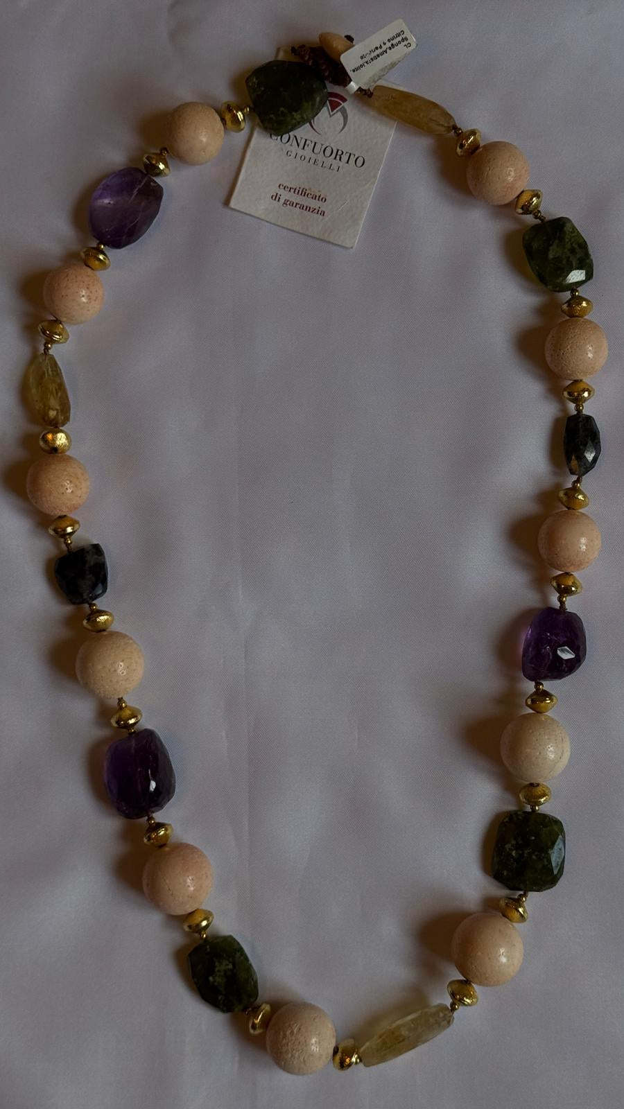 Collana realizzata con spugna, ametista, quarzo citrino e peridoto.